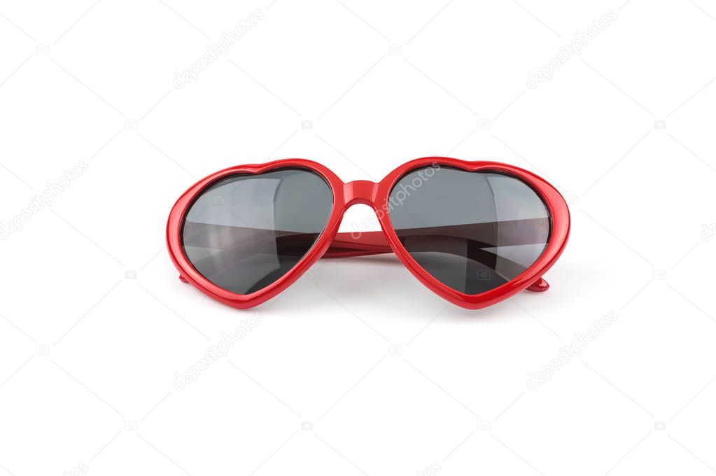 Red heart shaped sunglasses isolated on white background, summer holidays 