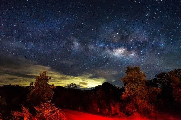 Milky way galaxy with stars and space dust in the universe, long speed exposure. Baan Na Sak, Mae Moh Lampang Thailand.