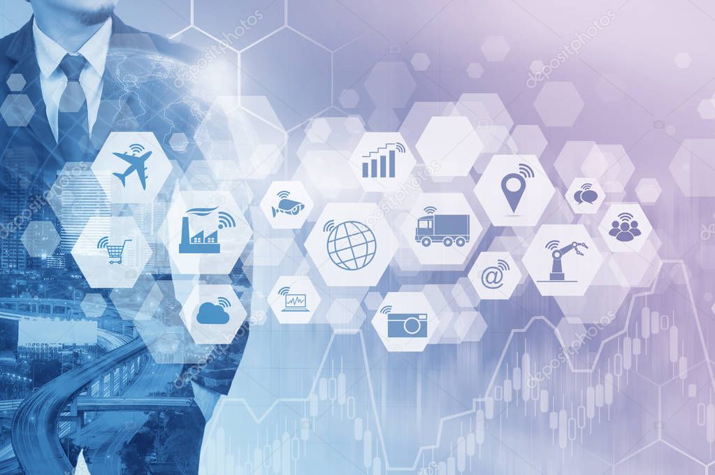 Double exposure of businessman and cityscape background with Internet of things (IOT) objects icon and Internet networking concept, Connect global wireless devices with each other.