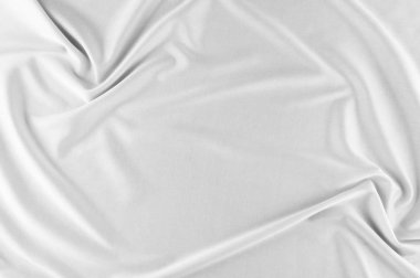 Pürüzsüz zarif beyaz ipek veya saten lüks kumaş düğün arka plan olarak kullanabilirsiniz. Lüks Noel arka plan veya yeni yıl arka plan tasarımı. beyaz kumaş dokusu. Kumaş Tekstil yüzey. üstten görünüm.