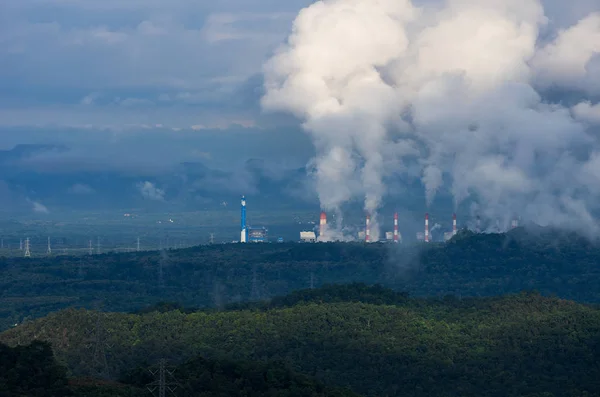 Air pollution over coal power plant  Mae Moh Lampang at morning with fog, Bird eye view.