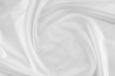 Pürüzsüz zarif beyaz ipek veya saten lüks kumaş düğün arka plan olarak kullanabilirsiniz. Lüks Noel arka plan veya yeni yıl arka plan tasarımı. beyaz kumaş dokusu. Kumaş Tekstil yüzey. üstten görünüm.