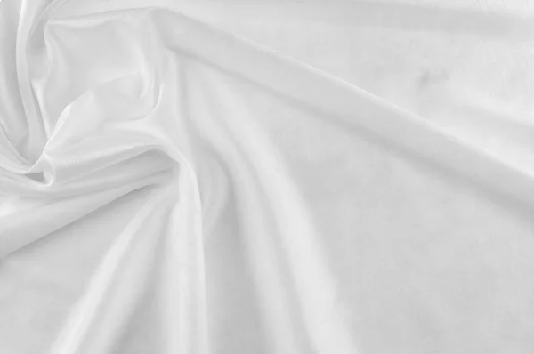 光滑典雅的白色丝绸或缎面豪华布可作为婚礼背景使用 豪华的圣诞背景或新年背景设计 白色织物质地 布织物表面 顶部视图 — 图库照片