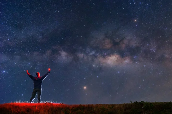 Climber Fire Hand Standing Rocky Mountain Peak Stars Milky Way — Stock Photo, Image