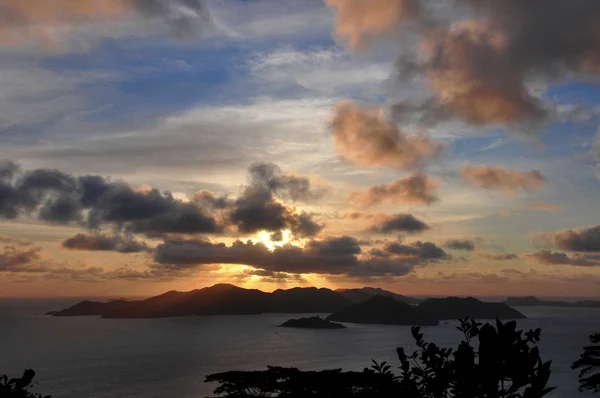 Sunset at the Island of Praslin from La Digue Island, Seychelles