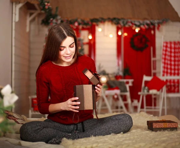 Happy Smiling Girl Opens Gift Holiday Home Christmas Eve — Stock Photo, Image