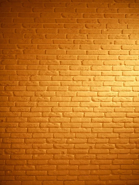 Fondo de ladrillo marrón texturizado pared vintage con luz — Foto de Stock