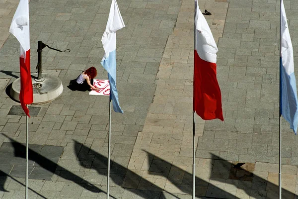 :       Polish flag white with red, flag MARYJNA church white with blue, girl paints red color on a white card ...