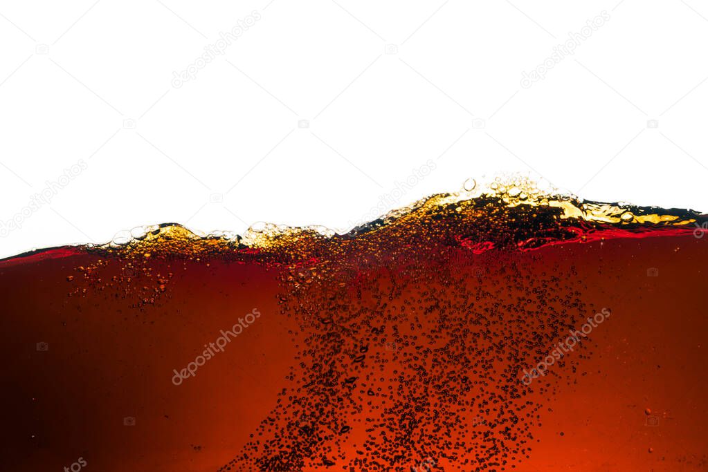 cola flavored soda bubbles on a white background