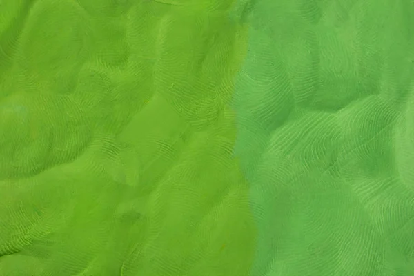 Fondo texturizado de plastilina verde — Foto de Stock