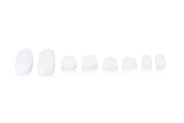 Tabletta fehér beteg elszigetelt fehér background. — Stock Fotó