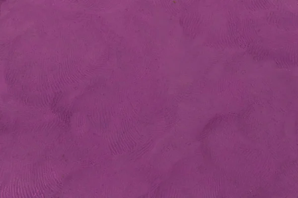 Пластилин фиолетовый текстурированный фон — стоковое фото