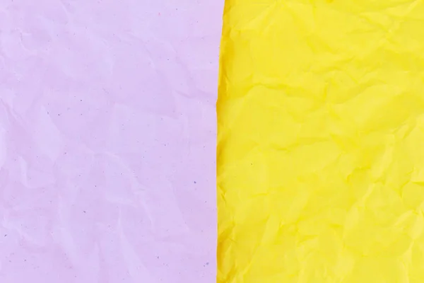Розовый и желтый скомканный бумажный фон — стоковое фото