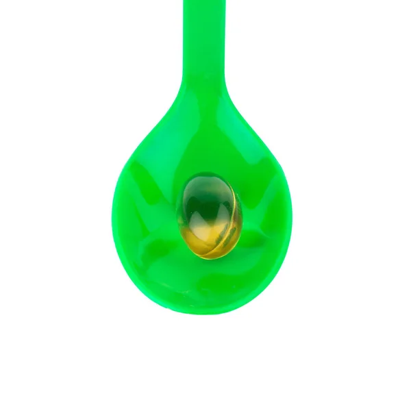 Colher de plástico verde — Fotografia de Stock