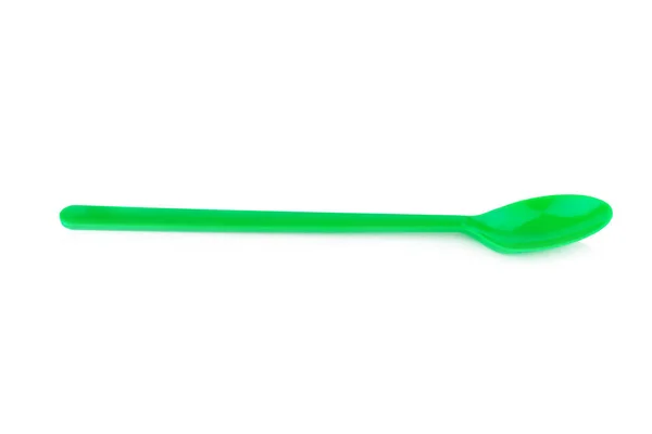 Cucchiaio di plastica verde isolato su sfondo bianco — Foto Stock