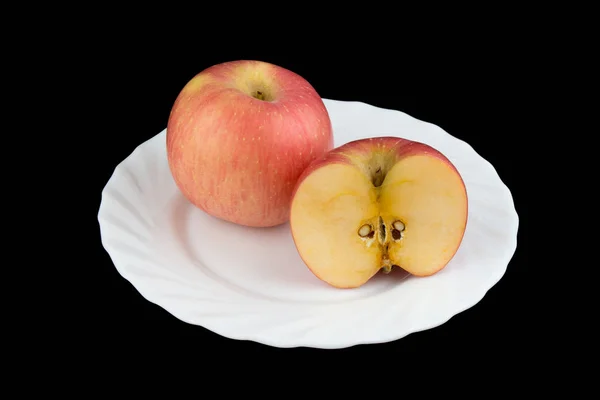 Apfel auf schwarzem Hintergrund. Gericht — Stockfoto