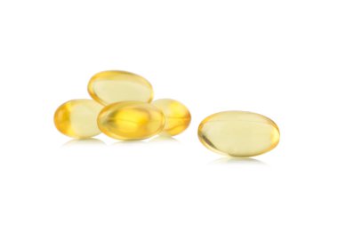 Kapsül balık yağı ile seçici odak izole üzerinde beyaz backgrou