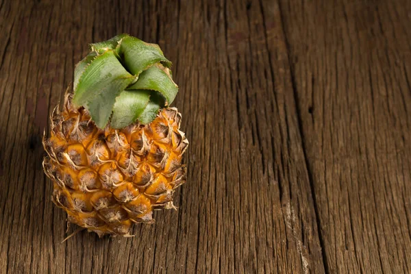 pineapple on wooden nature dish