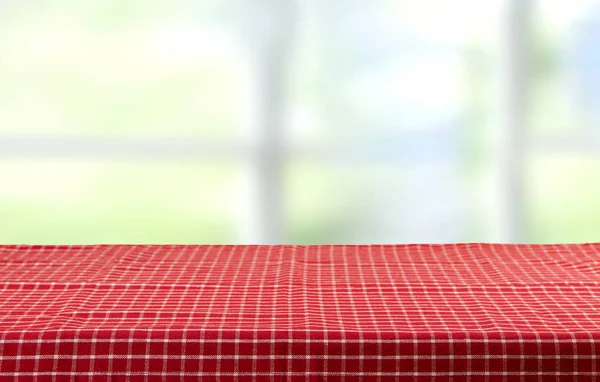 Mesa Vacía Con Mantel Cuadros Rojo Fondo Brillante Para Montaje —  Fotos de Stock