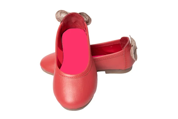 Kırmızı Ayakkabılar Beyaz Bir Arka Plan Üzerinde Izole Bir Altın — Stok fotoğraf