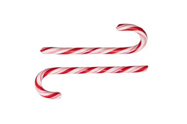 Geleneksel Noel çizgili baston şekerler beyaz arka planda izole edilmiş. Üst görünüm.