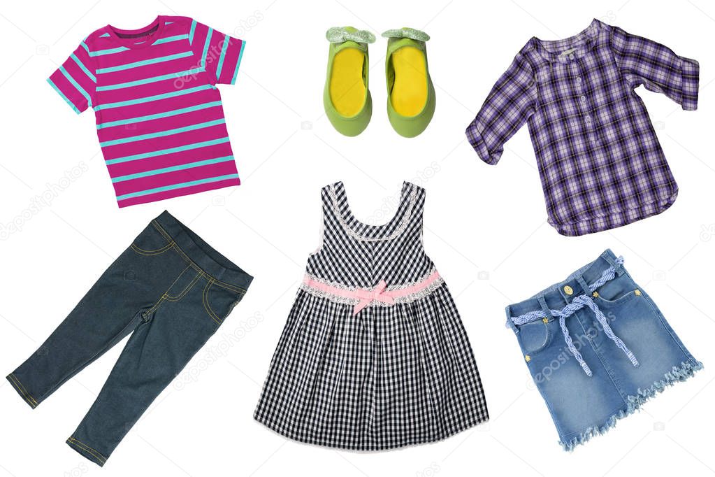 Summer fashion. Collage set of baby child girl clothes isolated on a white background. T-shirts, skirts, shoes or sneaker and jeans skirt.