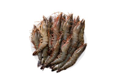 Deniz ürünleri arka plan. Beyaz bir arka plan üzerinde izole bir plaka üzerinde ham kaplan karides closeup. Üstten görünüm.