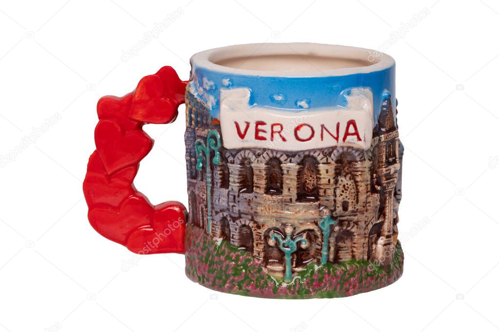 Romeo and Juliet concept. A souvenir made from ceramic of the balcony with Romeo and juliet isolated on a white background. Famous figures from Verona in Italy.