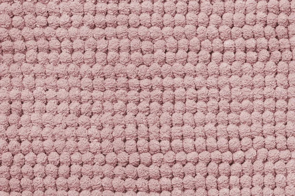 towel texture background for design and text. Macro.Pink texture. Closeup of a light seamless pink fluffy terry bath