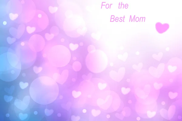 Happy Mothers Day card. Abstract festive pink blue bokeh background texture with a Best Mom greeting text and pink hearts — Stock Photo, Image