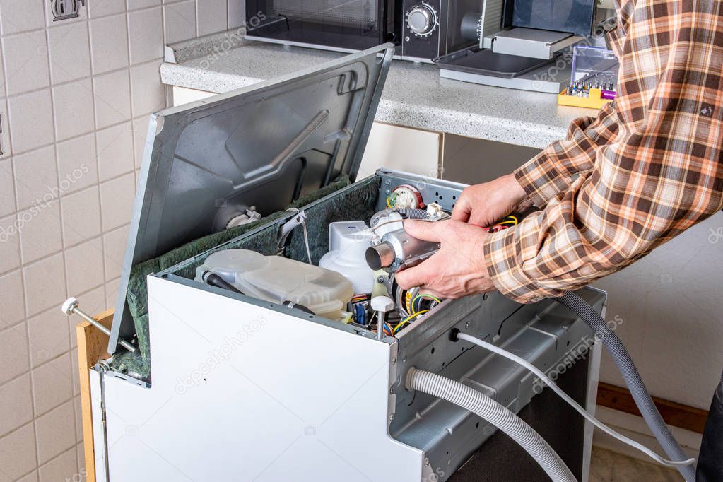 People in technician jobs. Appliance repair technician or handym