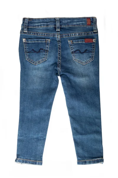 Barn jeans. Girl jeans byxor isolerade på vit bakgrund. J — Stockfoto