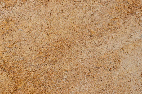 Beton duvarın kahverengi dokusu. Kahverengi sarı metnin yakın çekim