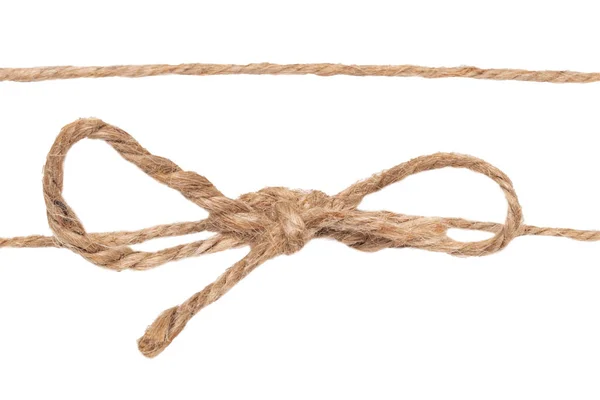 Крупный план узла бечевки или узла с луком и одной веревкой, изолированной на — стоковое фото