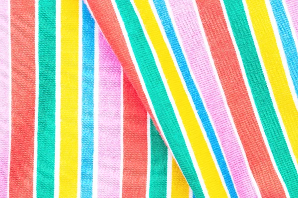 Rainbow backgrounds fabric. Closeup of rainbow textile with fres