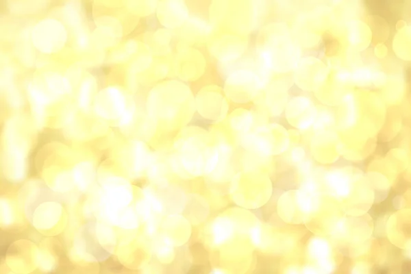 Uma textura de fundo de gradiente amarelo dourado delicado abstrato festivo com brilhantes círculos bokeh brilho desfocado. Conceito de cartão para Feliz Ano Novo, convite do partido, dia dos namorados ou outros feriados. — Fotografia de Stock