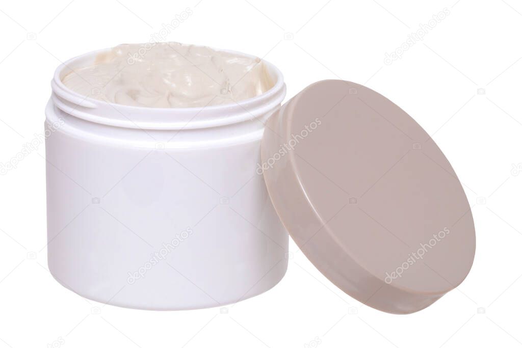 Cosmetic products isolated. Close-up of a opened cosmetic cream container with a professional cosmetic mud mask isolated on a white background. Macro of clay mask for face.