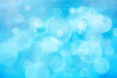 Soyut bulanık taze bahar ışığı hassas pastel mavi bokeh arkaplan dokusu parlak dairesel yumuşak renkli ışıklar. Kart konsepti. Güzel arkaplan illüstrasyonu.
