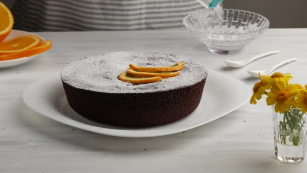 Chocolate Cake Decorated with orange slices. — Stock Video