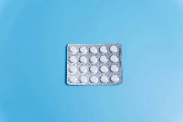 Hap paketi üzerinde mavi arka plan