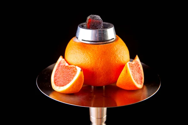 charcoal-filled grapefruit hookah