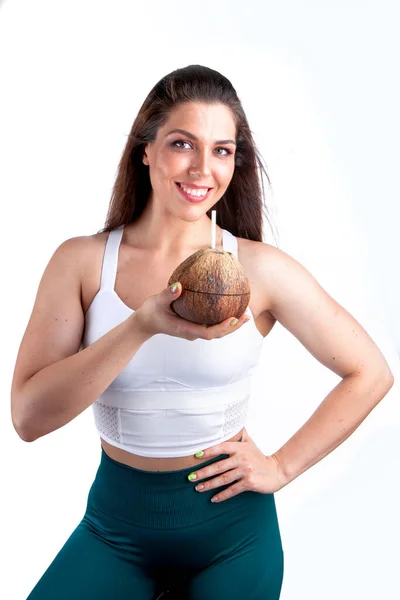 Kvinna Idrottsman Sportkläder Håller Cocktail Form Kokosnöt Med Ett Sugrör — Stockfoto
