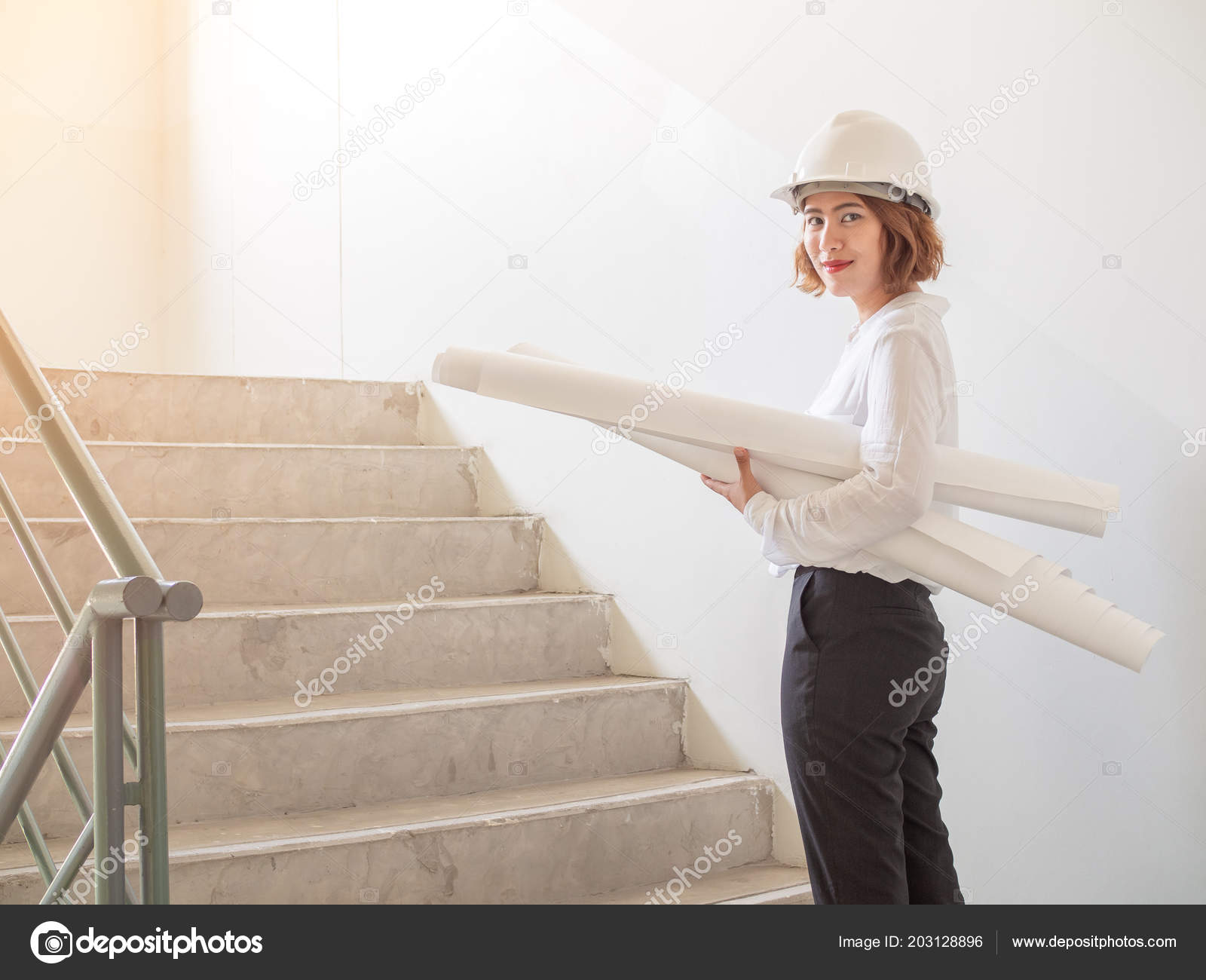 Beautiful Asian Woman Engineer Curly Short Hair Wearing White