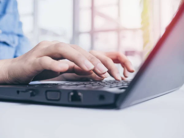 Close Hands Typing Black Laptop Computer Keyboard White Table White — Stok Foto