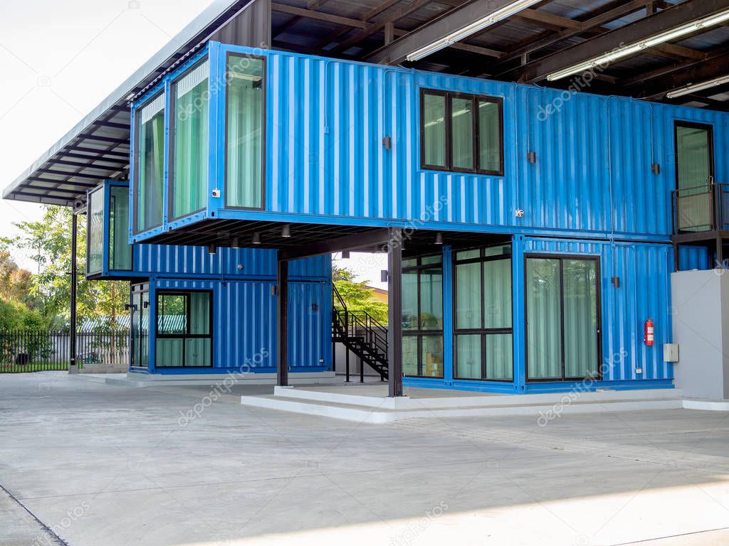 Modern blue cutting-edge shipping container construction office building.