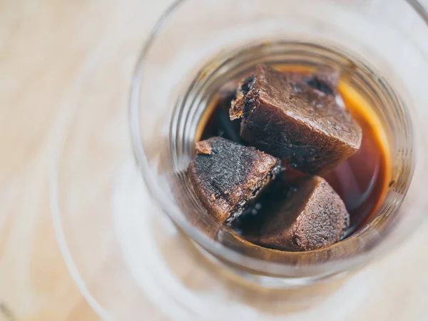 Close Coffee Ice Cubes Glass Wooden Table Top View Frozen — Stock Photo, Image