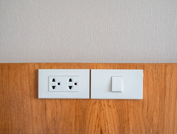 White electrical socket and white light switch