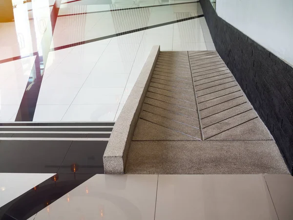 Concrete ramp way for support wheelchair disabled people inside