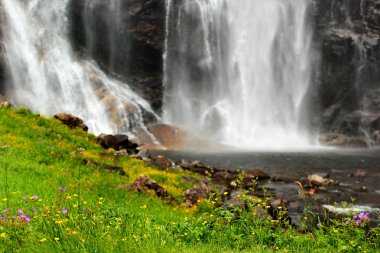 Skjervsfossen waterfall in Hordaland county, Norway clipart