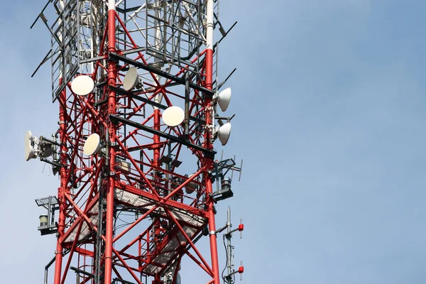 Telecommunication tower with radio equipment